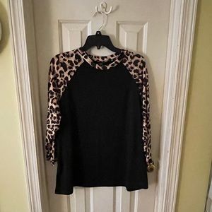 Black baseball style shirt with leopard print sleeves. Size XL New